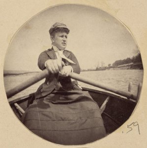 Woman in Hat Rowing a Boat by Unbekannt Unbekannt